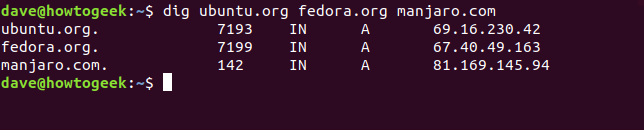 El comando "dig ubuntu.org fedora.org manjaro.com" en una ventana de terminal.