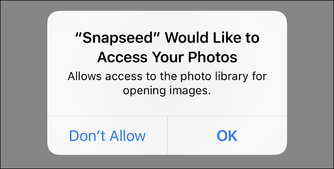 Una captura de pantalla de la aplicación de iOS "Snapseed" que solicita acceso a la aplicación Fotos.