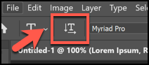 Haga clic en el icono T con las flechas horizontal y vertical.