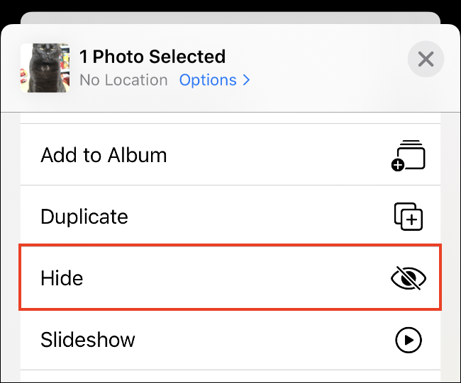 Toca "Ocultar" en la aplicación Fotos.