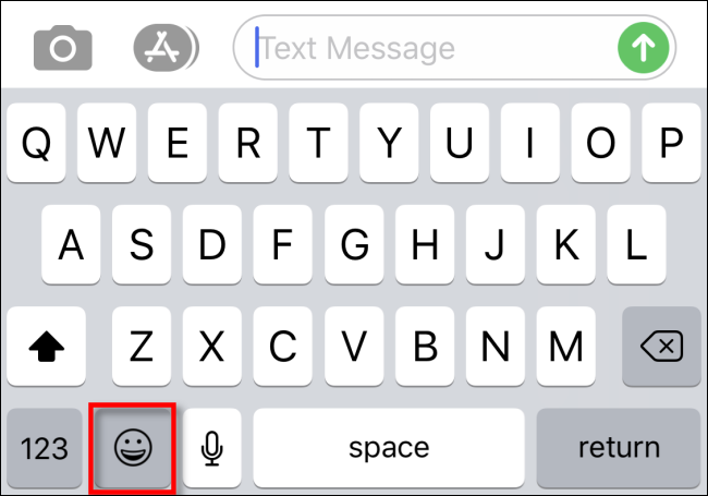 Un teclado de iPhone con un botón Emoji