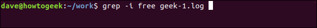 grep -i free geek-1.log en una ventana de terminal