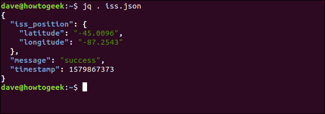 El comando "jq. Iss.json" en una ventana de terminal.