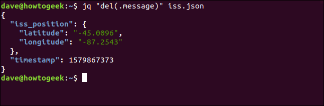 El comando "jq" del (.message) "iss.json" en una ventana de terminal.