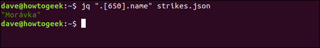 El comando "jq". [650] .name "strikes.json" en una ventana de terminal.