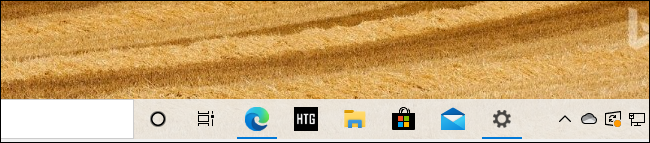 Un icono de la barra de tareas del sitio anclado en Edge para How-To Geek en Windows 10.