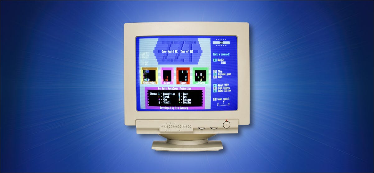 Un monitor de computadora CRT sobre un fondo azul.