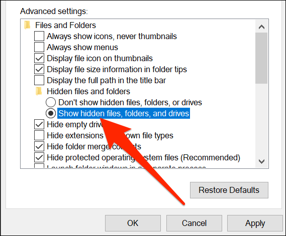 Seleccione "Mostrar archivos, carpetas y unidades ocultos" en la ventana Opciones de carpeta.