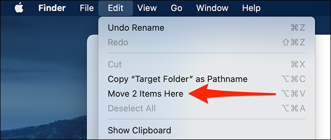 Seleccione "Editar> Mover elementos aquí" en la barra de menú del Finder.
