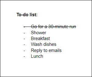 Una lista de tareas pendientes con tachado aplicado al primer elemento.