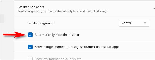 En Comportamientos de la barra de tareas, marque "Ocultar automáticamente la barra de tareas".
