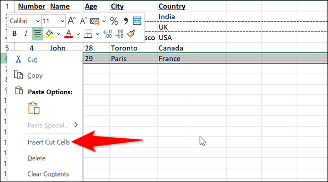 Haga clic con el botón derecho en el número de la fila de destino y seleccione "Insertar celdas cortadas" en Excel.