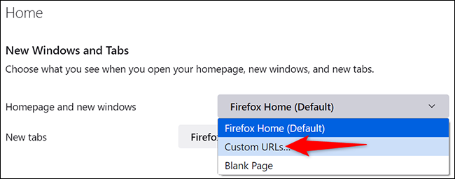 Accede al menú desplegable "Página de inicio y nuevas ventanas" y elige "URL personalizadas".