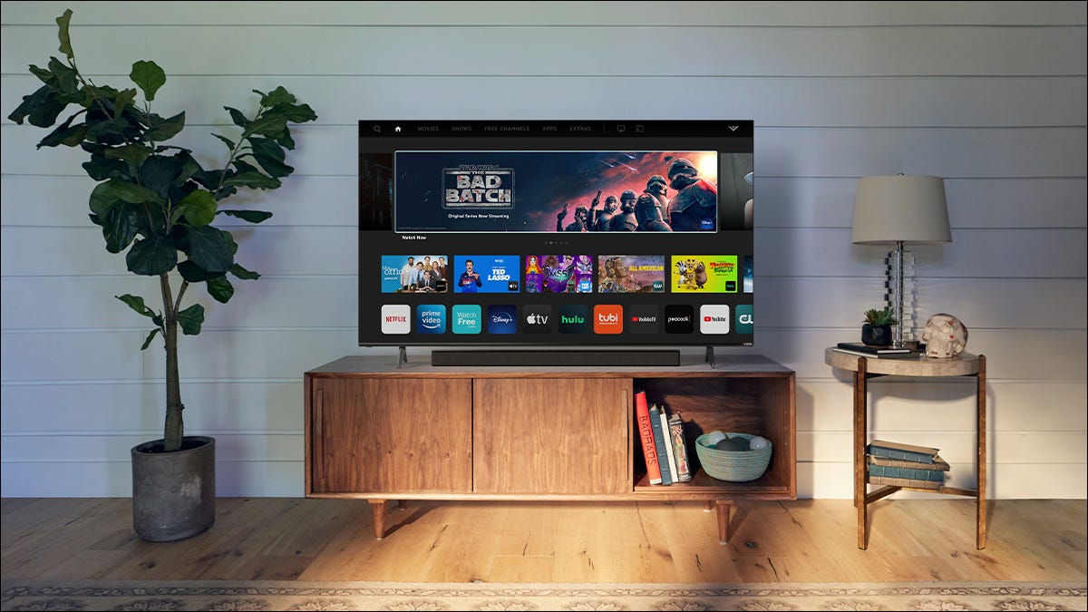 Vizio V-Series 58 Smart TV colocado en una configuración de vivienda