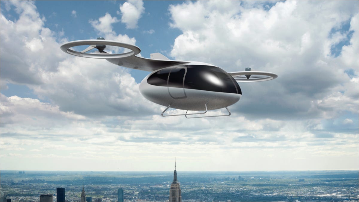 Un concepto de un dron de pasajeros que vuela sobre la ciudad de Nueva York.