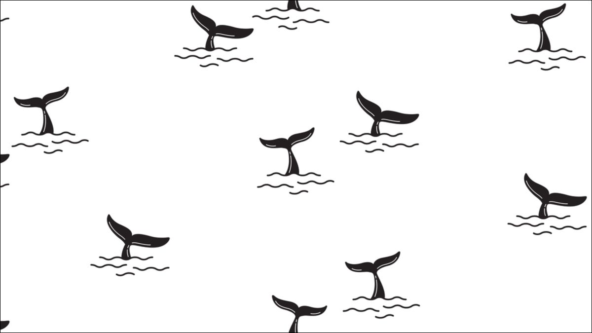 Patrón de aletas de ballena levantadas del océano.